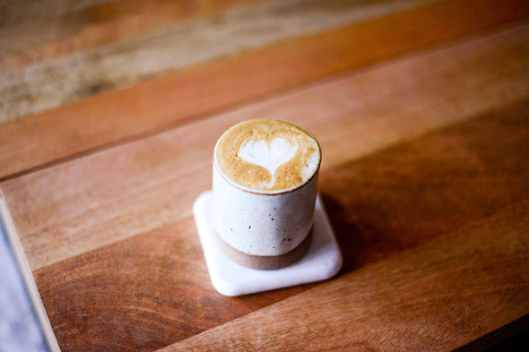 latte in ceramic stoneware cup
